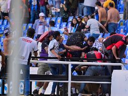 Una riña en el Estadio La Corregidora en Querétaro se suscitó durante el partido de la Jornada 9 de la Liga MX entre aficionados de Gallos Blando y Atlas. IMAGO7