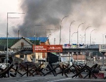 A pesar de los diversos intentos por frenar los ataques de la milicia rusa, las principales ciudades de ucranianas son bombardeadas. AFP/F. Senna