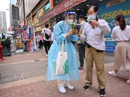 Autoridades de Salud de China informaron cuatro mil 051 nuevos casos hoy sábado, en descenso respecto a los cuatro mil 365 notificados en el día anterior. AFP / P. Parks