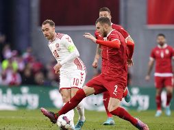 Eriksen (#10) fue declarado como el mejor jugador del partido. AFP / L. Sabroe