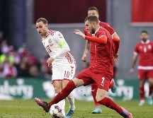 Eriksen (#10) fue declarado como el mejor jugador del partido. AFP / L. Sabroe
