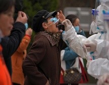 Las cifras vienen una carga considerable de incertidumbre porque muchos países han desistido de las pruebas, lo que significa que podría haber muchos casos no detectados. AP / A. Wong