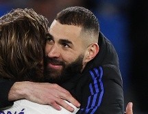 Karim Benzema marcó tres goles en la Ida de Cuartos de Final. AFP/ADRIAN DENNIS