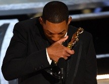 Will Smith dio una cachetada a Chris Rock en los Oscar 2022. AFP / ARCHIVO