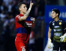 Cristian Calderón es uno de los últimos egresados del Atlas que se han vestido con la camiseta de las Chivas, y también fue criticado por besar el escudo del Guadalajara a la primera oportunidad. IMAGO7