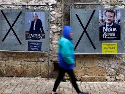 Elección cerrada. Los electores, entre Le Pen y Macron. EFE/S. Nogier