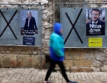 Elección cerrada. Los electores, entre Le Pen y Macron. EFE/S. Nogier