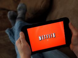 FILE - In this Friday, Jan. 17, 2014, file photo, a person displays Netflix on a tablet in North Andover, Mass. Netflix reports earnings Monday, April 17, 2017. (AP Photo/Elise Amendola, File) Earns Netflix-JAN. 17, 2014, FILE PHOTO