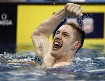 Armstrong, superó la anterior marca mundial de 23.80. AFP/J. Tilton