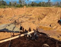 La policía visitó el sitio de la mina abandonada que sepultó a las 12 mujeres de Indonesia. AFP/M. Agussalim