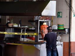 Tres delincuentes golpearon a clientes y empleados de una taquería. AFP/ARCHIVO