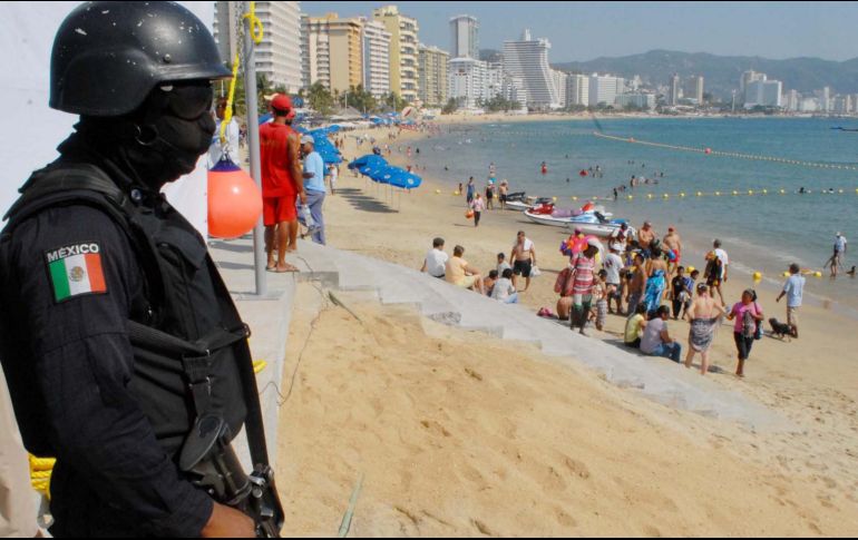 Ayer, un turista fue asesinado en la playa Icacos y su acompañante quedó herida. NOTIMEX/Archivo