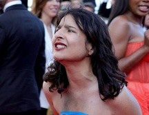 Los servicios de seguridad apartaron rápidamente a la mujer de Cannes 2022. AFP / V. Hache