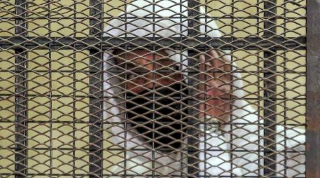 Mohamed al Amin en una jaula de acusado durante su juicio por 