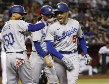 La ofensiva de los Dodgers se activó pronto con dobles consecutivos de Mookie Betts y Freeman en el primer capítulo. AFP / C. Coduto