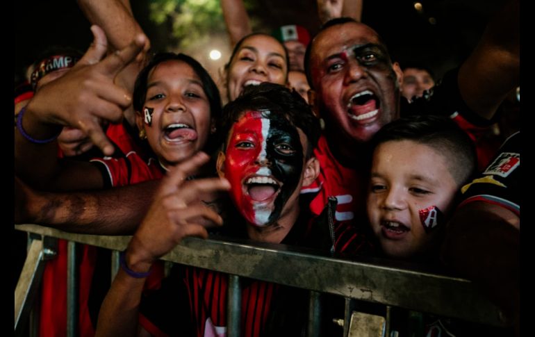 Rojinegros festejando en Guadalajara el triunfo en el Clausura 2022. EL INFORMADOR/ G. GALLO