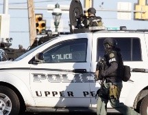 Policías encontraron en el lugar dos armas semiautomáticas y un cargador de alta capacidad. No hay detenidos. EFE / T. Mihalek