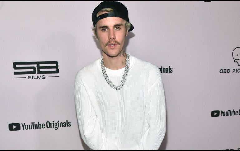 La empresa rechazó este martes haber usado la imagen del cantante canadiense Justin Bieber en sus productos sin su consentimiento. AFP / ARCHIVO