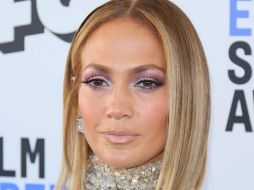 JLo se robó la atención al presentarse con un vestido transparente. AFP / ARCHIVO