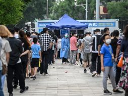 Este sábado, China registró un total de 138 nuevos casos de covid, casi la mitad de ellos en Beijing, según cifras oficiales. AFP / J. Gao