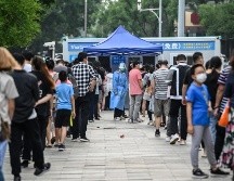 Este sábado, China registró un total de 138 nuevos casos de covid, casi la mitad de ellos en Beijing, según cifras oficiales. AFP / J. Gao