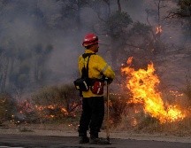 El fuego inició en medio de las olas de calor extremo que azotan a partes de California. AFP/R. Chiu