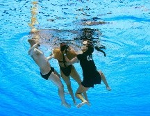 Al final todo quedó en solo un susto y eso fue gracias a la intervención de la entrenadora de Anita, Andrea Fuentes. AFP/O. SCARFF