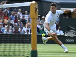 A sus 35 años, Novak Djokovic aspira a un cuarto título consecutivo en Wimbledon, algo de lo que sólo Pete Sampras, Björn Borg y Roger Federer pueden presumir. AFP / G. Kirk