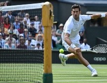A sus 35 años, Novak Djokovic aspira a un cuarto título consecutivo en Wimbledon, algo de lo que sólo Pete Sampras, Björn Borg y Roger Federer pueden presumir. AFP / G. Kirk