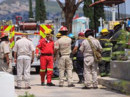El cuerpo fue extraído con ayuda de Bomberos de Guadalajara, debido a que estaba a dos metros de profundidad. CORTESÍA