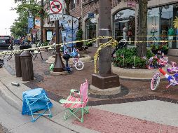 El presunto tirador estaba en el techo de una tienda y comenzó a disparar contra la multitud que seguía el desfile. EFE/T.Maury