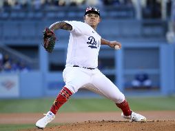 JULIO URÍAS. El pitcher zurdo ponchó a siete y dio un pasaporte para ganar por primera vez a los Rockies en el Dodger Stadium. AFP / K. Djansezian