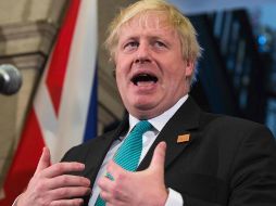 Boris Johnson anunció que dejará el cargo, una vez se haya designado a su sucesor. Se irá, como lo hizo Trump en su momento, humillado y con la popularidad por los suelos. AFP / ARCHIVO