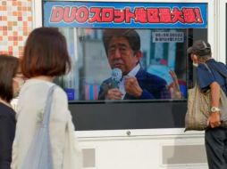 El asesinato conmociona a los japoneses. GETTY IMAGES