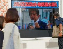 El asesinato conmociona a los japoneses. GETTY IMAGES
