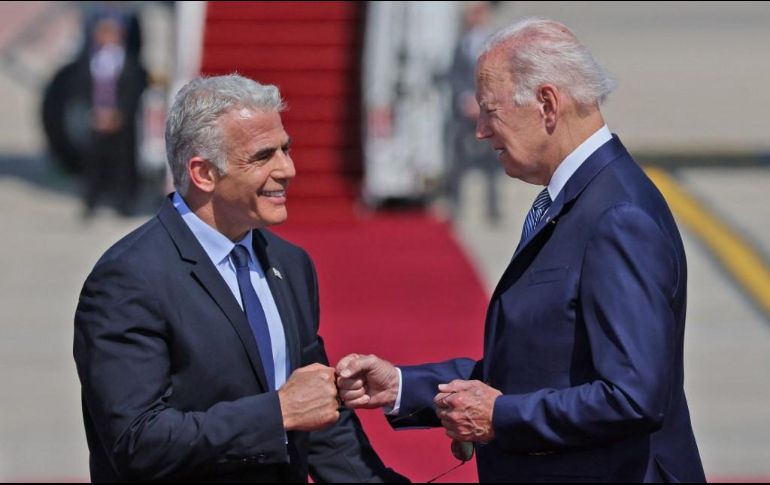 El primer ministro israelí, Yair Lapid y el mandatario estadounidense, Joe Biden. AFP / J. Guez