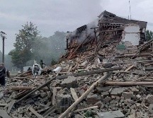 El sábado, misiles rusos alcanzaron edificios residenciales en Nikopol, matando a dos personas. AFP