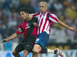 Los encuentros entre el Guadalajara y Atlas siempre están llenos de emociones, pues cada balón se juega como si fuera el último. EL INFORMADOR/Archivo