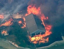 El incendio en torno al lago Possum Kingdom había consumido unas 202 hectáreas y estaba contenido en un 10% este martes. AP/KDFW FOX 4