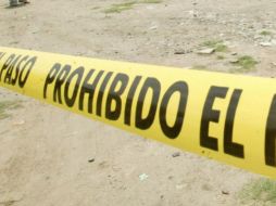 Agentes del Ministerio Público recabaron indicios y llevaron la investigación bajo el protocolo de feminicidio. EL INFORMADOR / ARCHIVO