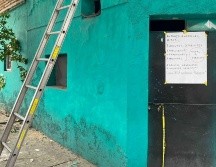 Personal de la Unidad de Protección Civil y Bomberos de Jalisco puso un cartel con la leyenda 
