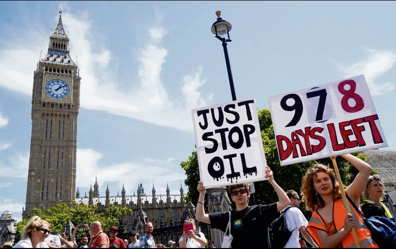 Manifestantes llaman al Gobierno a tomar medidas ambientales urgentes. AFP/N. Hallen