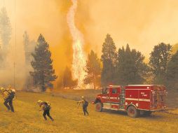 Brigadistas combaten el fuego en el Parque Nacional. AFP/J. Sullivan