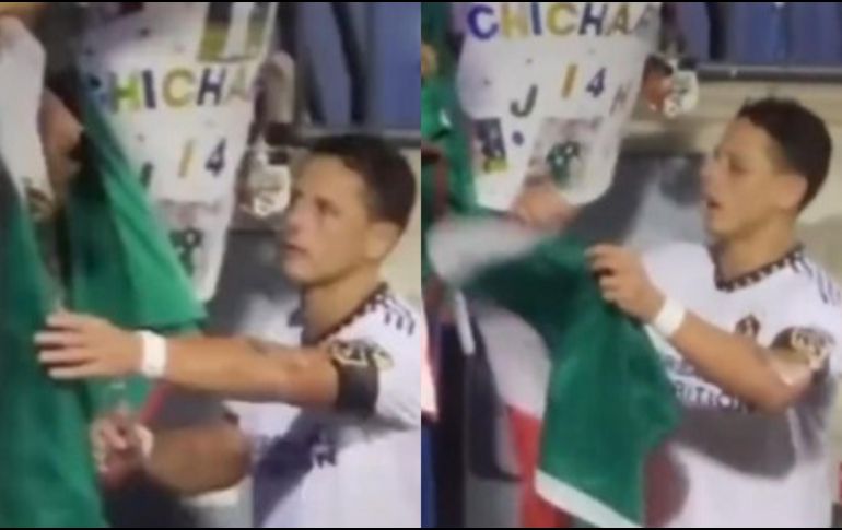El video está circulando por redes sociales y se aprecia como Javier Hernández le dice al aficionado que le da la Bandera que no se la puede firmar y luego la tira al piso. ESPECIAL