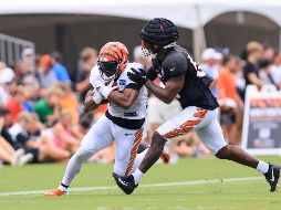 Los gorros pueden reducir al menos en 10% la severidad de un impacto al cerebro de un jugador. AP/A. Doster