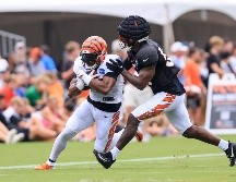Los gorros pueden reducir al menos en 10% la severidad de un impacto al cerebro de un jugador. AP/A. Doster