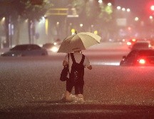 Las lluvias comenzaron la mañana del lunes y se intensificaron hacia la tarde. AFP/YONHAP