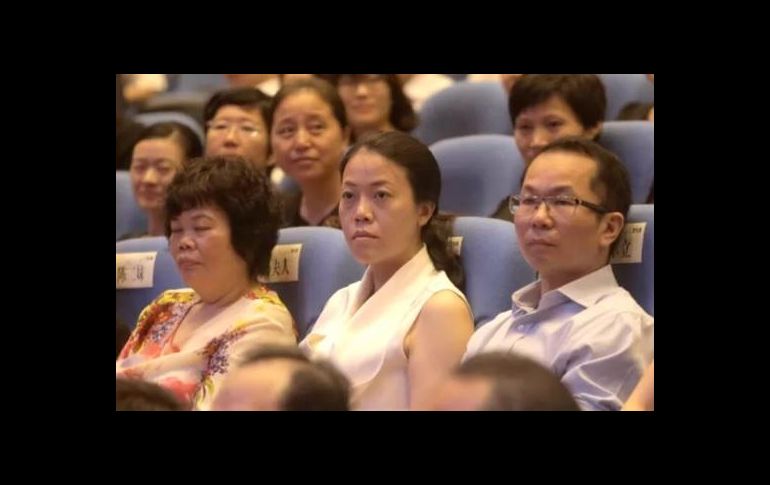 Yang Huiyan (en el centro) es la mujer más rica de Asia. ALAMY