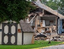 Imágenes aéreas publicadas en redes sociales muestran daños y vehículos de socorro en un vecindario residencial de Evansville. AP/M. Brown