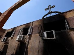 El incendio, cuyo origen aún no se ha determinado, ocurrió en la iglesia Abou Sifine del barrio popular de Imbaba. AFP / K. Desouki